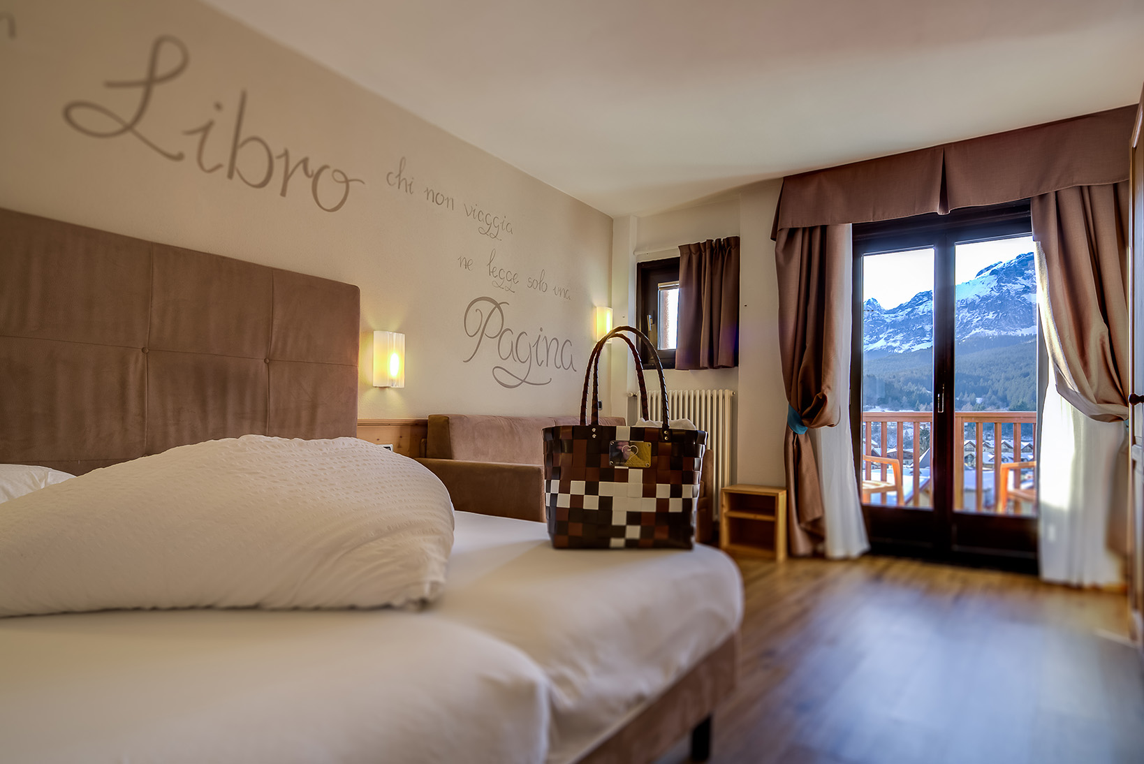 La camera Harmony di Hotel Cavallino sulle Dolomiti di Brenta